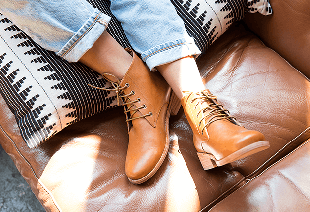 fortress of inca womens leather boots on a couch