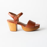 brown leather clog sandal on a white background