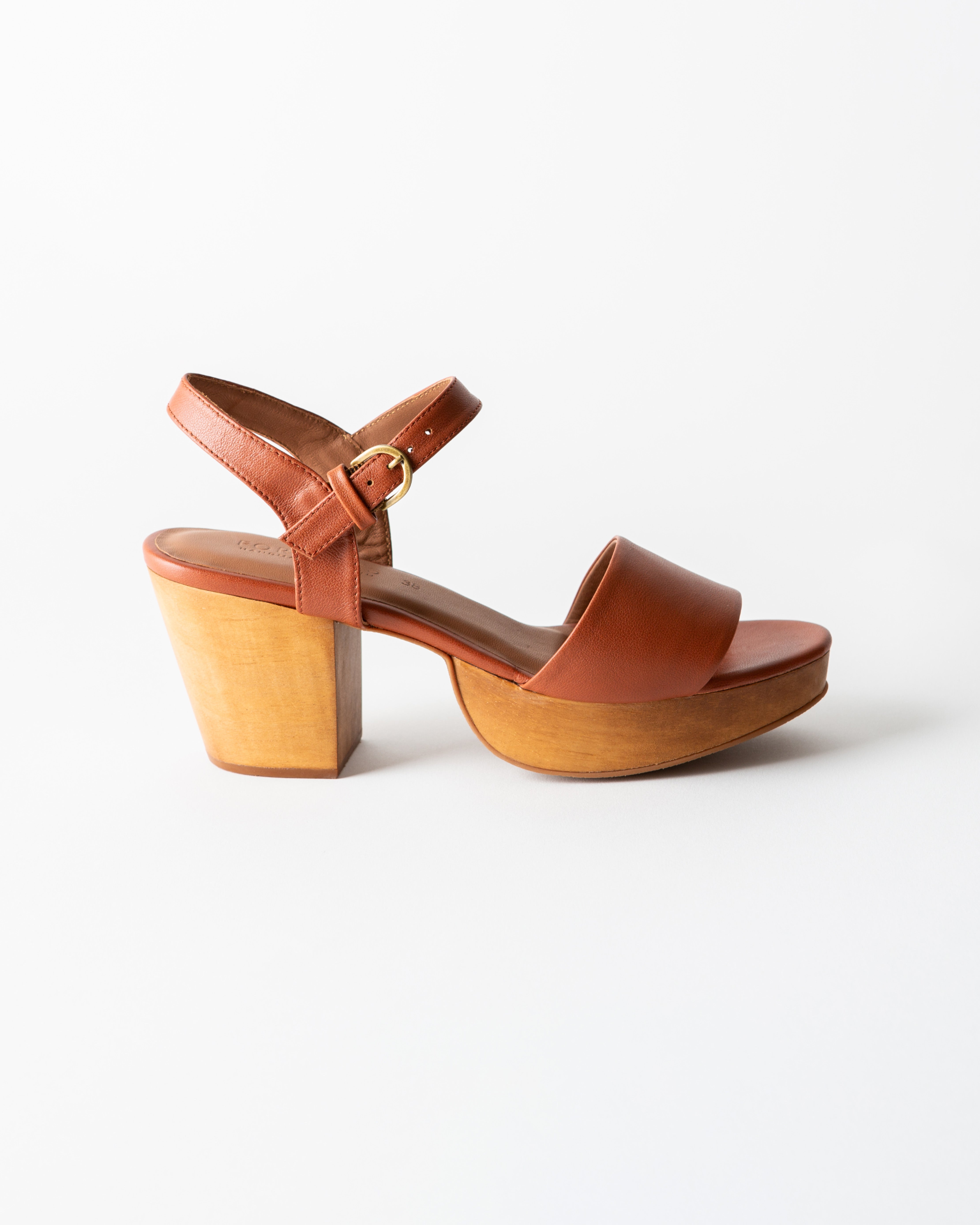 brown leather clog sandal on a white background
