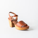 brown leather clog sandal on a white background