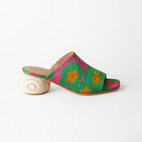 Colorful sandal with floral pattern on a white background